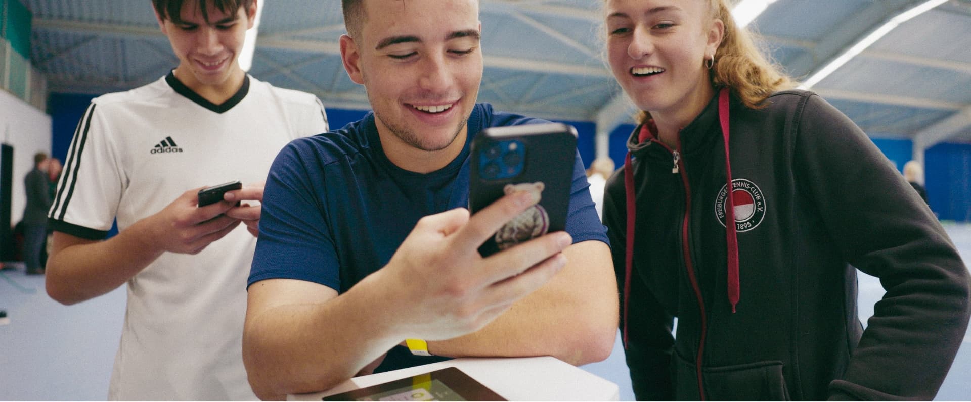 Tennis player watching tennis match