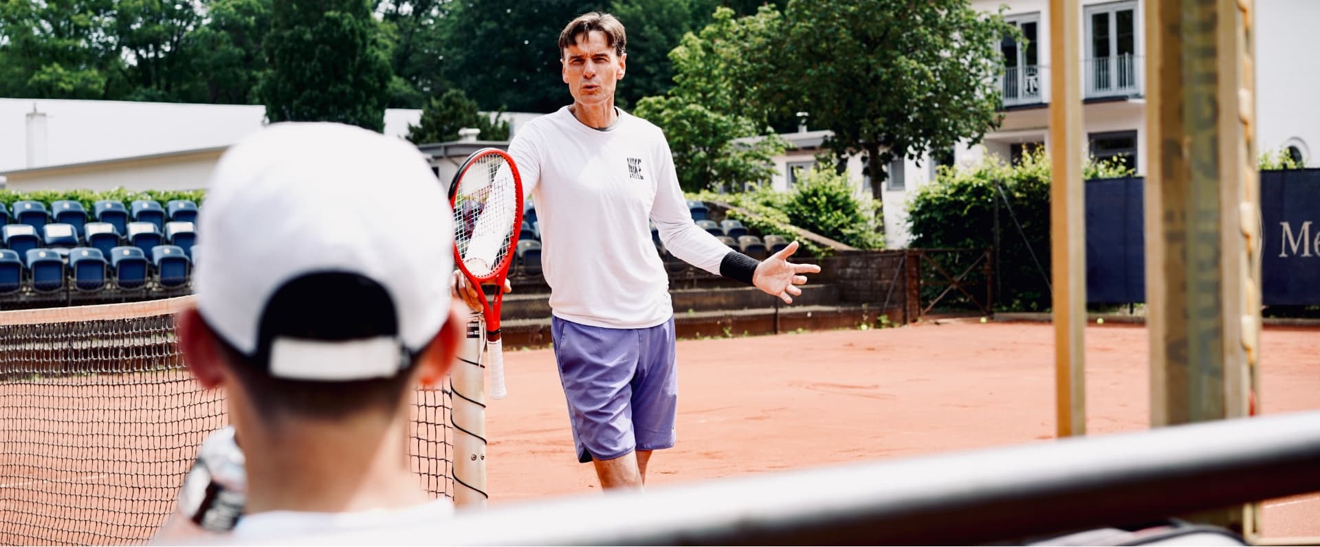 Trainer on a wingfield court