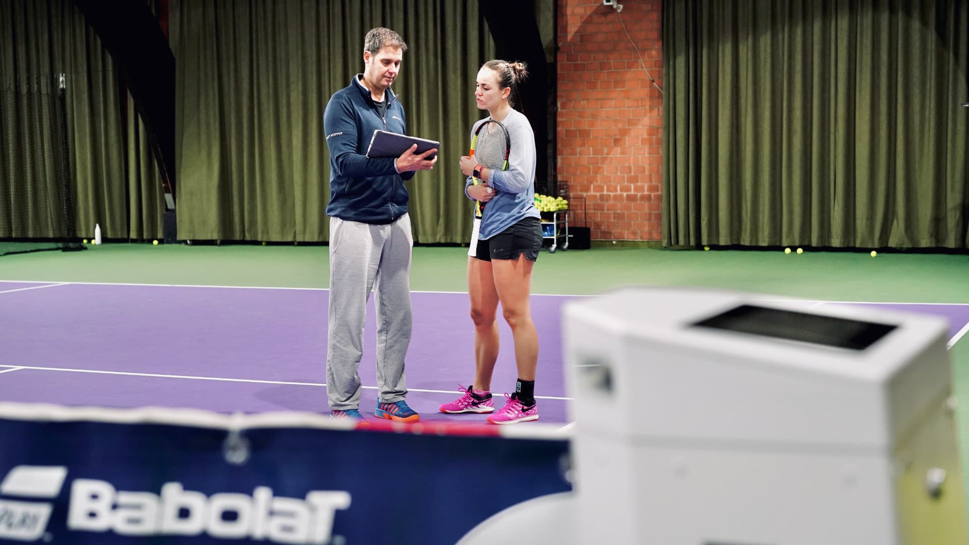 Goellner and player on the court.